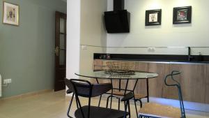 Nhà bếp/bếp nhỏ tại Casa De Libros en Granada +18 ảnh