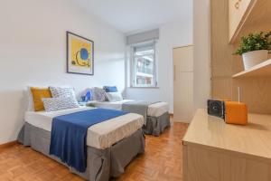 Posteľ alebo postele v izbe v ubytovaní Ferrara a 5 min dalla Stazione Apartment x5