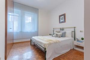 Posteľ alebo postele v izbe v ubytovaní Ferrara a 5 min dalla Stazione Apartment x5