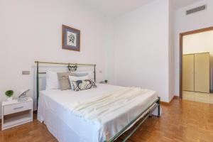 Posteľ alebo postele v izbe v ubytovaní Ferrara a 5 min dalla Stazione Apartment x5