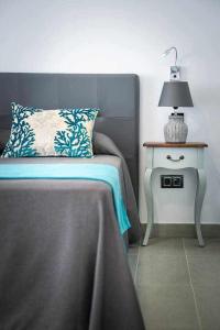 Łóżko lub łóżka w pokoju w obiekcie Two Dreams Luxury Villa