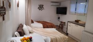 Posteľ alebo postele v izbe v ubytovaní Apartments Luky