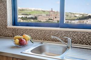 Foto sihtkohas Għajnsielem asuva majutusasutuse Ir-Rixa Holiday Penthouse galeriist