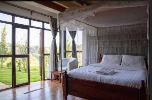 Säng eller sängar i ett rum på Sipi Valley Resort