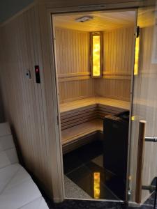 Łóżko lub łóżka w pokoju w obiekcie Hotel Sanova
