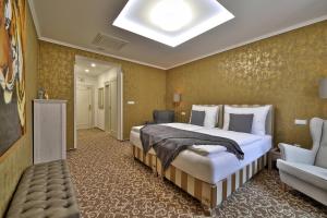 Postel nebo postele na pokoji v ubytování Hotel Pod Bránou