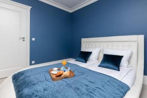 Łóżko lub łóżka w pokoju w obiekcie Sailor Apartment Jastrzębia Góra by Renters Prestige