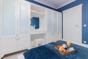 Łóżko lub łóżka w pokoju w obiekcie Sailor Apartment Jastrzębia Góra by Renters Prestige