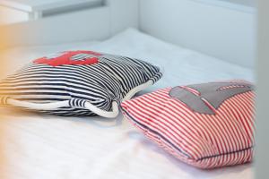 Łóżko lub łóżka w pokoju w obiekcie Sailor Apartment Jastrzębia Góra by Renters Prestige