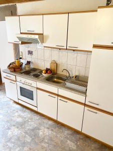 A kitchen or kitchenette at Waldruhe Appartements