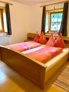A bed or beds in a room at Waldruhe Appartements