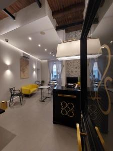 Posezení v ubytování L'Infinito 88 Charmant Rooms