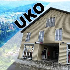 斯辛訥查的住宿－Котедж UKO，建筑物边的标志,用“交换”一词