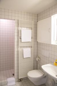 Ванная комната в Bischöfliches Seminar St. Willibald