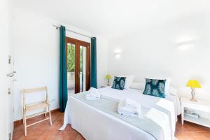 Ένα ή περισσότερα κρεβάτια σε δωμάτιο στο Villa Jacelia +27 φωτογραφίες