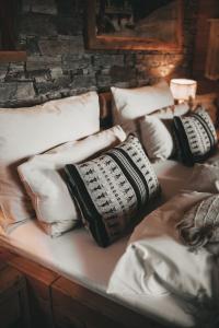 Postel nebo postele na pokoji v ubytování Jufenalm BOHO Hotel & Restaurant