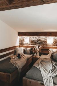 Postel nebo postele na pokoji v ubytování Jufenalm BOHO Hotel & Restaurant