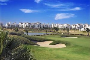 - Vistas al campo de golf de un complejo en Townhouse overlooking golf course, en Las Armeras