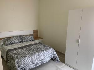 Posteľ alebo postele v izbe v ubytovaní La Villa Hostal