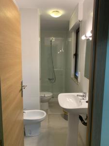Kúpeľňa v ubytovaní La Villa Hostal