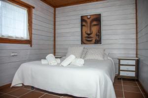 Łóżko lub łóżka w pokoju w obiekcie Rural Tarifa Beach Las Cabañas