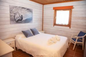 Łóżko lub łóżka w pokoju w obiekcie Rural Tarifa Beach Las Cabañas