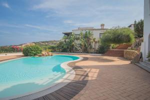 The swimming pool at or close to Il Giardino degli Oleandri