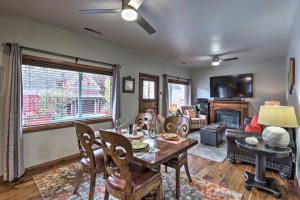 a living room with a table and chairs and a couch at Downtown Park City Vacation Rental Near Ski Lift! in Park City