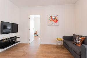 TV a/nebo společenská místnost v ubytování Apartmani Benzon