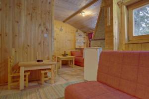 Et opholdsområde på Magic Cottage + 16 billeder