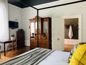Postel nebo postele na pokoji v ubytování de Wingerd B & B