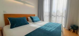 Cama o camas de una habitación en Boavista Class Inn