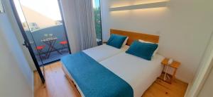 Cama o camas de una habitación en Boavista Class Inn