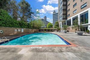 a swimming pool in the middle of a building at 1001 Free Parking, 2 Bd, Modern DTW, Great Wifi in Atlanta