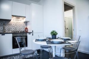 O bucătărie sau chicinetă la Il Puccino - Modern Apartment +2 fotografii