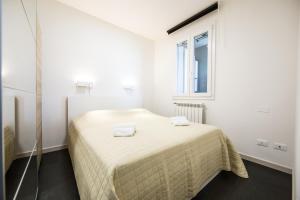 Un pat sau paturi într-o cameră la Il Puccino - Modern Apartment