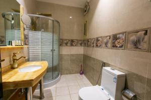 Koupelna v ubytování Lambert ApartHotel