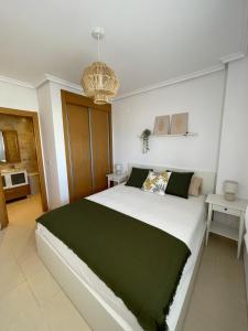 Postel nebo postele na pokoji v ubytování Apartamento MagicWorld + 26 fotografií