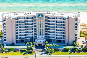 a large hotel with the ocean in the background at Spanish Key 408 in Pensacola