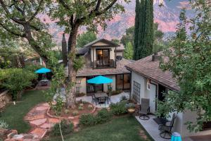 an aerial view of a house with a patio at Red Rock Inn Cottages in Springdale