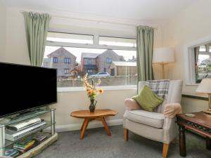 TV tai viihdekeskus majoituspaikassa Home View