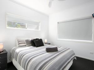 Ένα ή περισσότερα κρεβάτια σε δωμάτιο στο Avalon 3