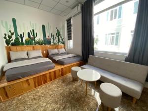 Postel nebo postele na pokoji v ubytování Homestay SALA