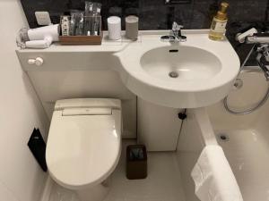 Um banheiro em Henn na Hotel Premier Nara