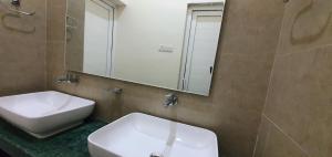 Koupelna v ubytování Shree Suites