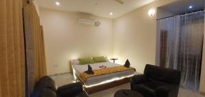Posezení v ubytování Shree Suites
