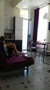 Khu vực ghế ngồi tại Apartments na Prosvesheniya 147/1