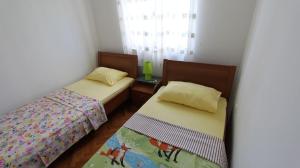 Zdjęcie z galerii obiektu Apartment Kukolj w mieście Vantačići