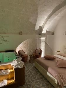Posezení v ubytování Nenetta Rooms & Suites Monopoli + 37 fotografií
