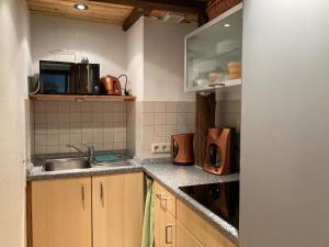 Kuchyň nebo kuchyňský kout v ubytování Ferienwohnung Schmidt